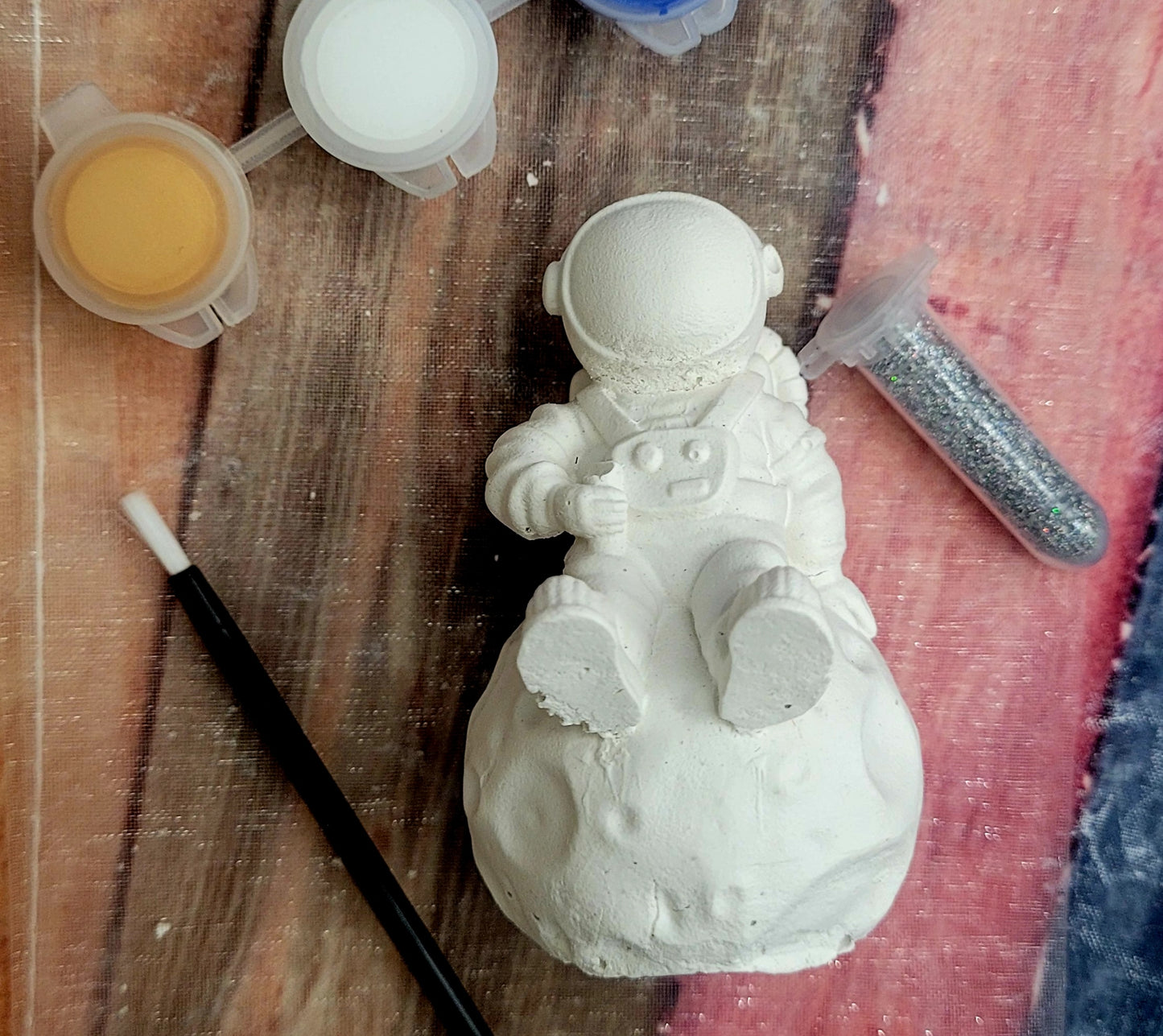 Astronaut sitting on planet rocket planet Plaster Painting